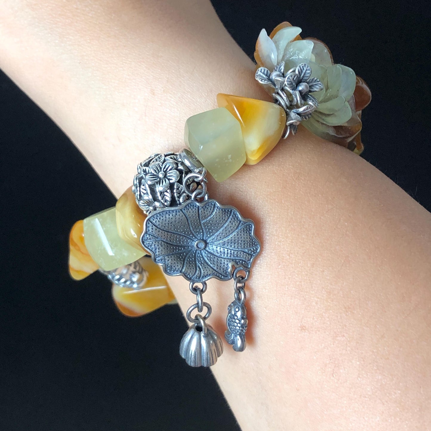 Xiu Jade Serpentine Carved Goldfish Lotus Charm with Irregular Bead Bracelet | Orange Jade | 925 Sterling Silver & Vintage Tibetan Silver accessory hand carved jade carving hand engraved jade bracelet elastic bracelet orange jade bracelet carved goldfish carving engraved lotus carving gift for her duy bracelet natural jade untreated jade dangle bracelet charm bracelet gift for her