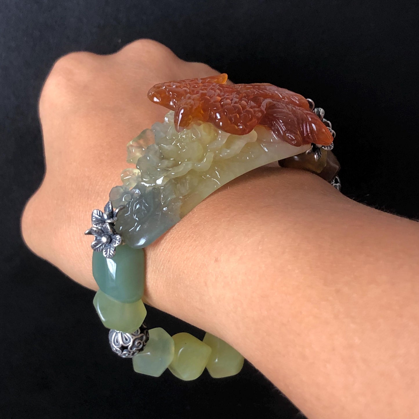 Natural Xiu Jade Serpentine Hand Carved Phoenix & Peony Flower Charm with Irregular Bead Bracelet | Reddish Orange Jade | Vintage Tibetan Silver | Crystal Stone Gemstone Personalized Gift for her Natural Multi-coloured Jade customised bracelet hand engraved jade bracelet carved charm carved pendant phoenix carving peony bracelet yellow jade green jade blue jade red jade silver bracelet tailor made bracelet personalised bracelet diy bracelet untreated jade elastic stretch bracelet