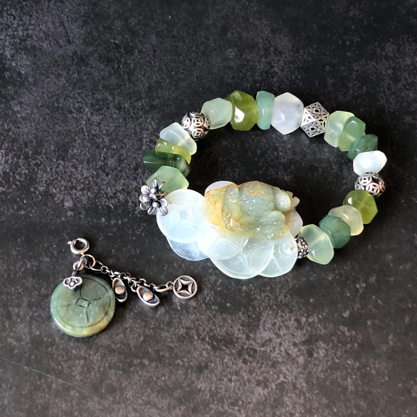 Xiu Jade Serpentine Hand Carved Toad & Coins with Irregular Bead Bracelet: Natural Green and White Jade with Vintage Tibetan Silver Accessory | Crystal Stone Gemstone Gift for her Green Jade Carving White Jade Yellow Jade Jewelry diy bracelet untreated jade carved good luck charm engraved blue toad charm big bead Chunky Bead Bracelet elastic stretch bracelet 3D stone carving personalized bracelet customized bracelet tailor made toad lover gift fortune charm prosperity charm dangle