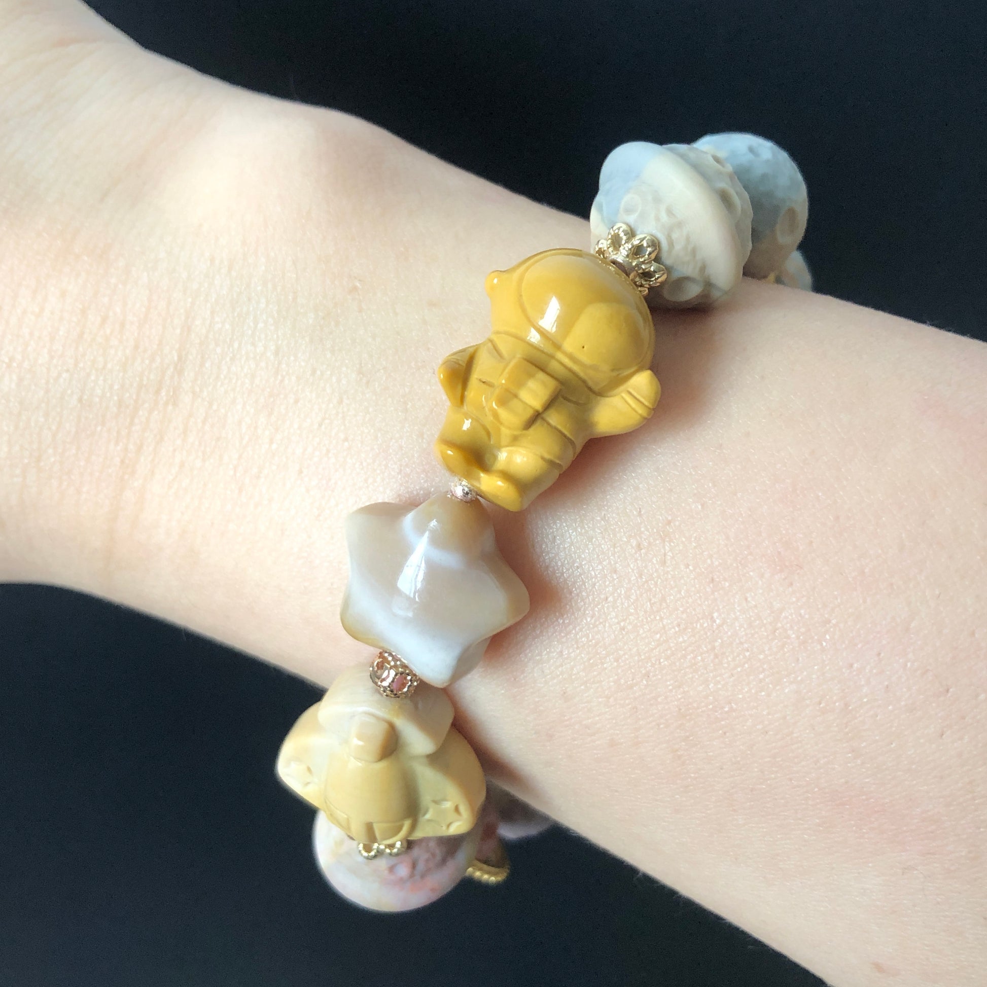 Alashan Agate astronaut with Planet, Meteorite, Star and Plane carved Charm Bead Bracelet | Swirl Pattern | Crystal Gemstone DIY Bracelet