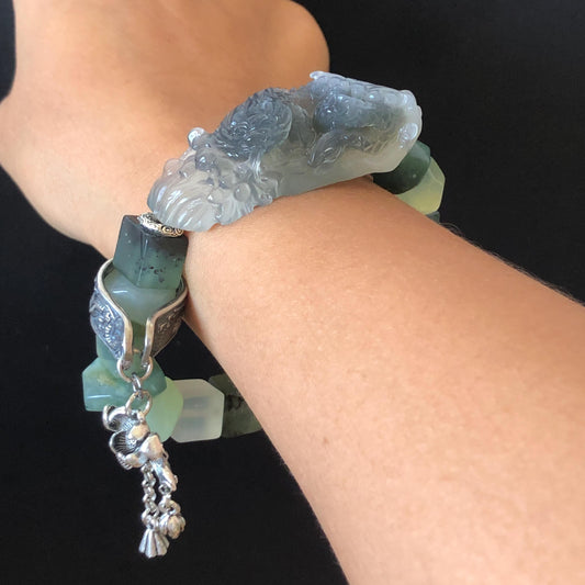 Xiu Jade Serpentine Hand Carved Sea Dragon Charm Irregular Bead Bracelet | Natural Ice Gray White Jade | Vintage Tibetan Silver | Personalized Gift for her  elastic stretch bracelet jade carving hand engraved gray jade grey jade white jade green jade hand engraved jade bracelet hand carved jade charm hand engraved jade pendant irregular bead bracelet big beaded bracelet dangle bracelet  silver accessory vintage bracelet antique bracelet dragon carving engraved dragon tailor made customized gift