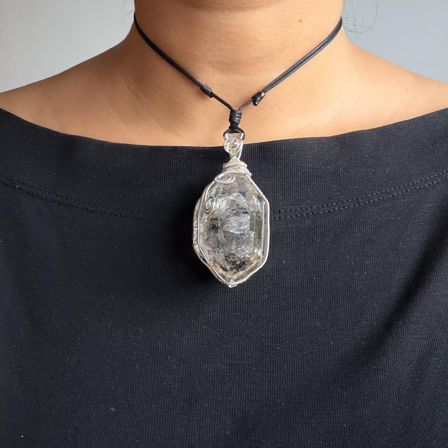 Polished Enhydro Skeleton Quartz (Herkimer Diamond) Wire Wrapped Pendant Adjustable Necklace: Moving White Sand, Black Sand, Black Mica, Black Bubble Inclusion Crystal | Natural Gemstone Birthstone enhydro quartz sand water-fall  choker gemstone charm stone pendant choker polished stone pendant crystal charm birthstone men necklace chakra crystal purify stone minerals specimen adjustable choker mica quartz mica flakes silver wire wrapped pendant yellow clay skeleton crystal Elestial Quartz