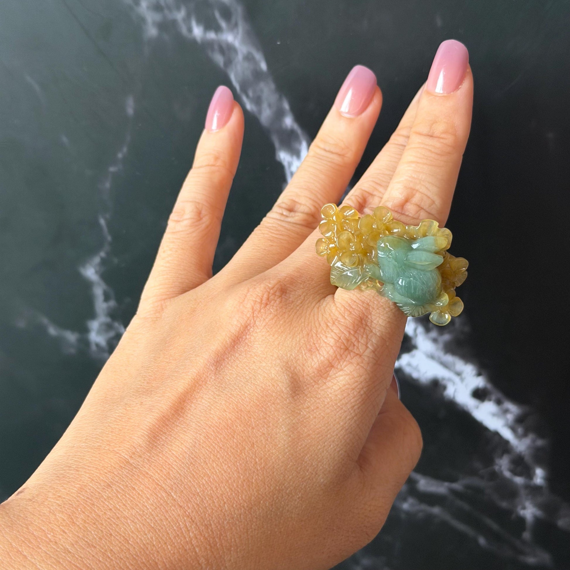 Xiu Jade (Serpentine) Hand Carved Rabbit & Flower Statement Ring 17.7mm (US 7-7.25): Natural Green Yellow Jade 3D stone carving Statement Ring Band Ring gift for her green jade carving yellow jade bi colour jade rabbit carving hand engraved statement ring flower carving hand carved flower natural untreated jade handcrafted jade ring 3D carving Stone carving Gemstone Carving rabbit Lover gift jade cocktail ring jade band ring bunny ring bunny carving