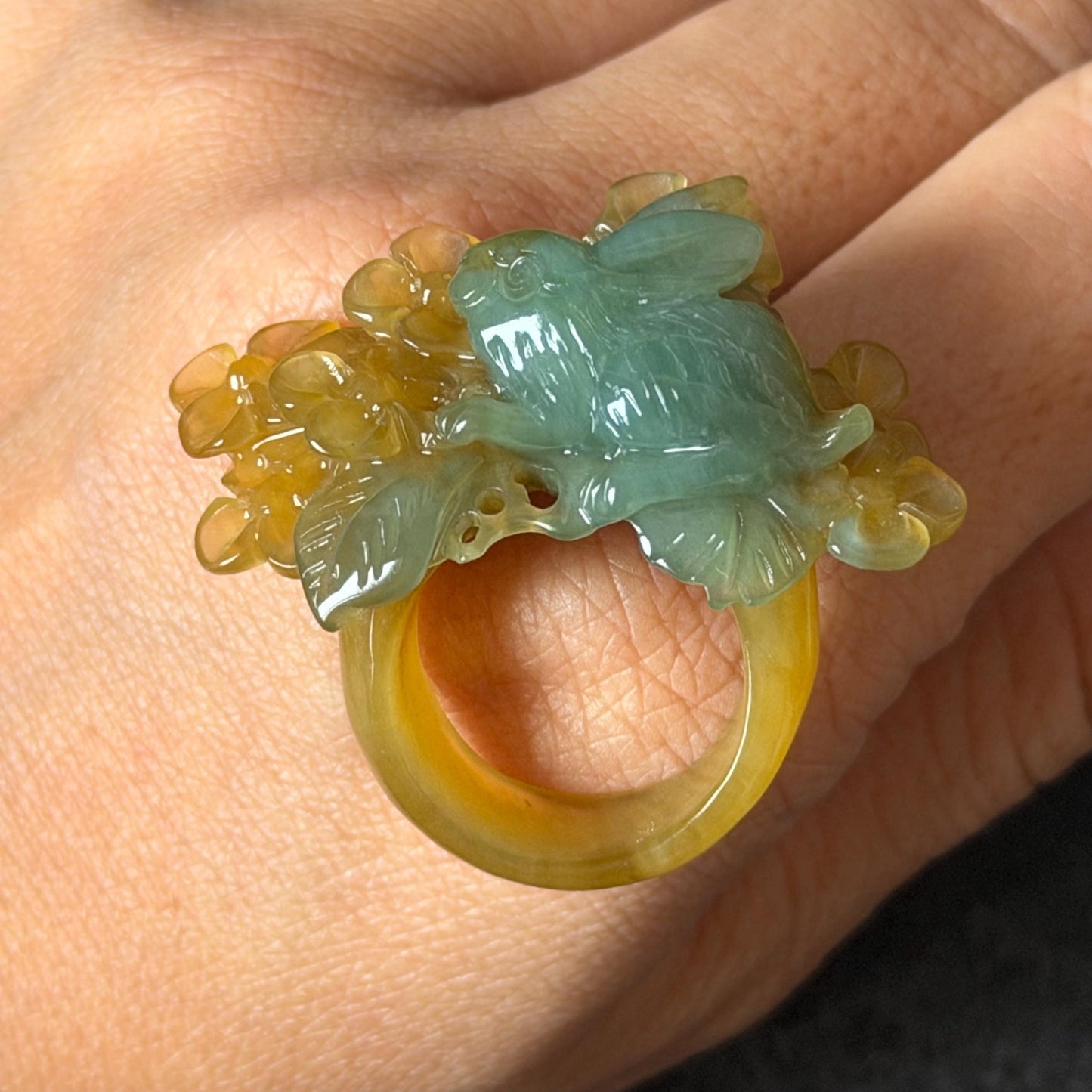 Xiu Jade (Serpentine) Hand Carved Rabbit & Flower Statement Ring 17.7mm (US 7-7.25): Natural Green Yellow Jade 3D stone carving Statement Ring Band Ring gift for her green jade carving yellow jade bi colour jade rabbit carving hand engraved statement ring flower carving hand carved flower natural untreated jade handcrafted jade ring 3D carving Stone carving Gemstone Carving rabbit Lover gift jade cocktail ring jade band ring bunny ring bunny carving
