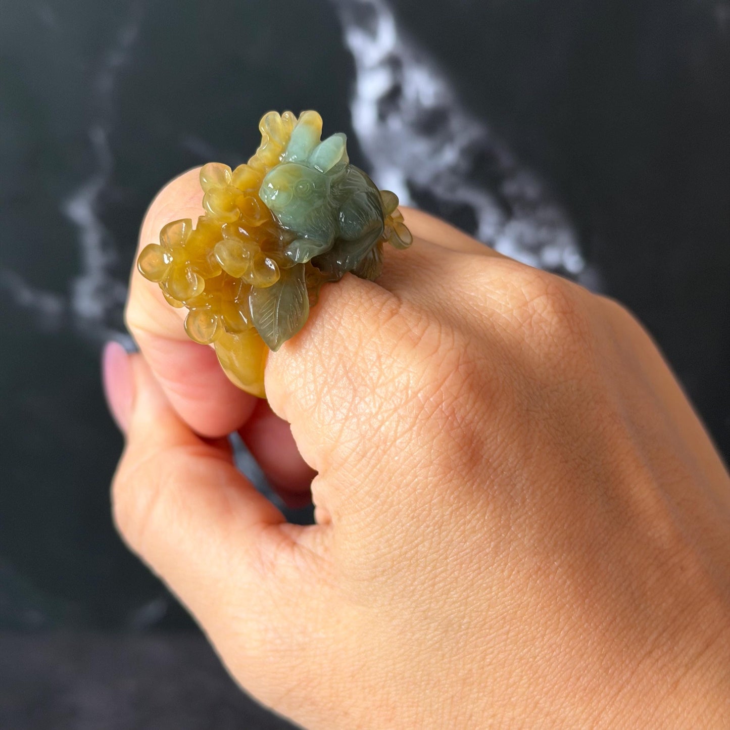 Xiu Jade (Serpentine) Hand Carved Rabbit & Flower Statement Ring 17.7mm (US 7-7.25): Natural Green Yellow Jade 3D stone carving Statement Ring Band Ring gift for her green jade carving yellow jade bi colour jade rabbit carving hand engraved statement ring flower carving hand carved flower natural untreated jade handcrafted jade ring 3D carving Stone carving Gemstone Carving rabbit Lover gift jade cocktail ring jade band ring bunny ring bunny carving