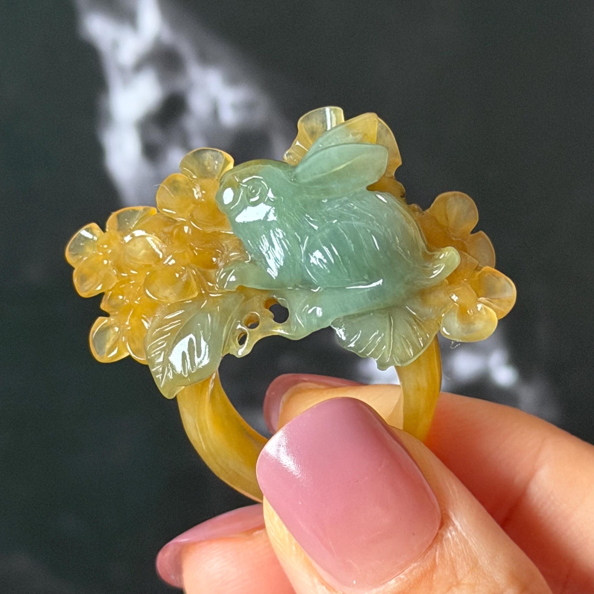 Xiu Jade (Serpentine) Hand Carved Rabbit & Flower Statement Ring 17.7mm (US 7-7.25): Natural Green Yellow Jade 3D stone carving Statement Ring Band Ring gift for her green jade carving yellow jade bi colour jade rabbit carving hand engraved statement ring flower carving hand carved flower natural untreated jade handcrafted jade ring 3D carving Stone carving Gemstone Carving rabbit Lover gift jade cocktail ring jade band ring bunny ring bunny carving
