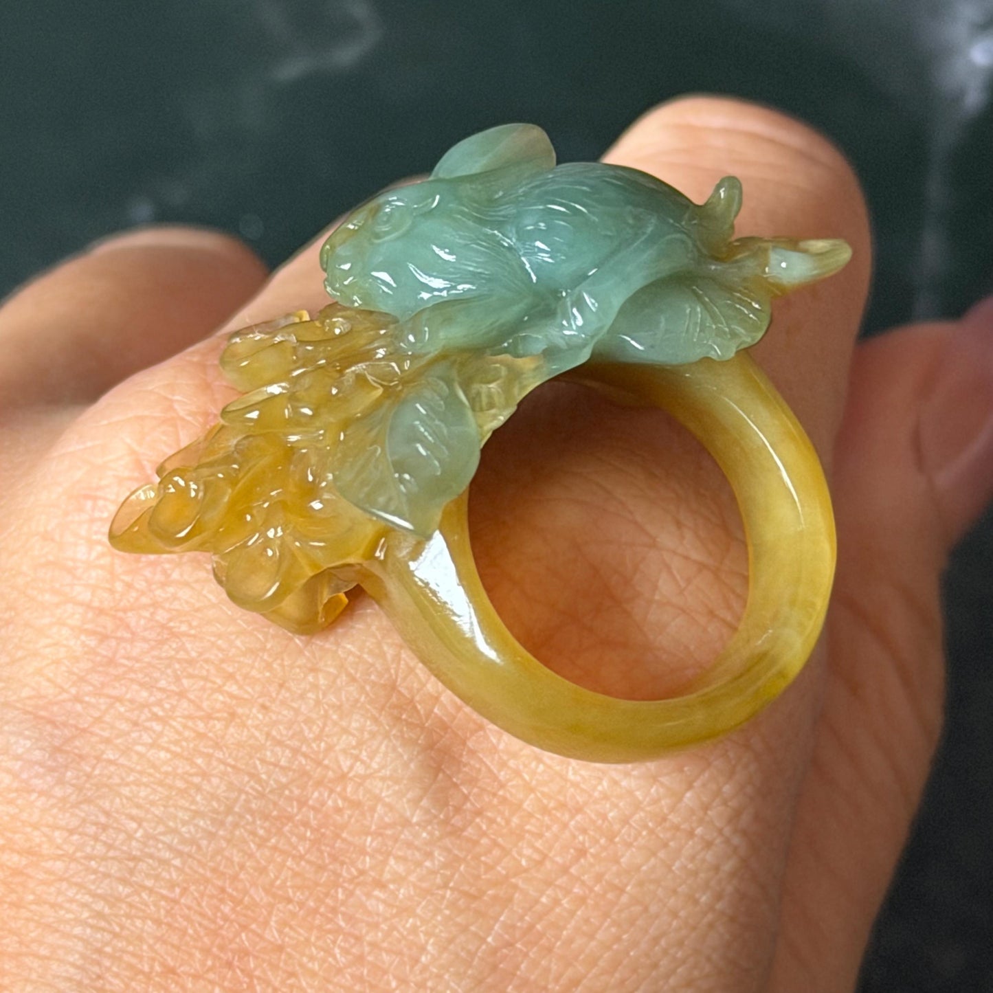 Xiu Jade (Serpentine) Hand Carved Rabbit & Flower Statement Ring 17.7mm (US 7-7.25): Natural Green Yellow Jade 3D stone carving Statement Ring Band Ring gift for her green jade carving yellow jade bi colour jade rabbit carving hand engraved statement ring flower carving hand carved flower natural untreated jade handcrafted jade ring 3D carving Stone carving Gemstone Carving rabbit Lover gift jade cocktail ring jade band ring bunny ring bunny carving