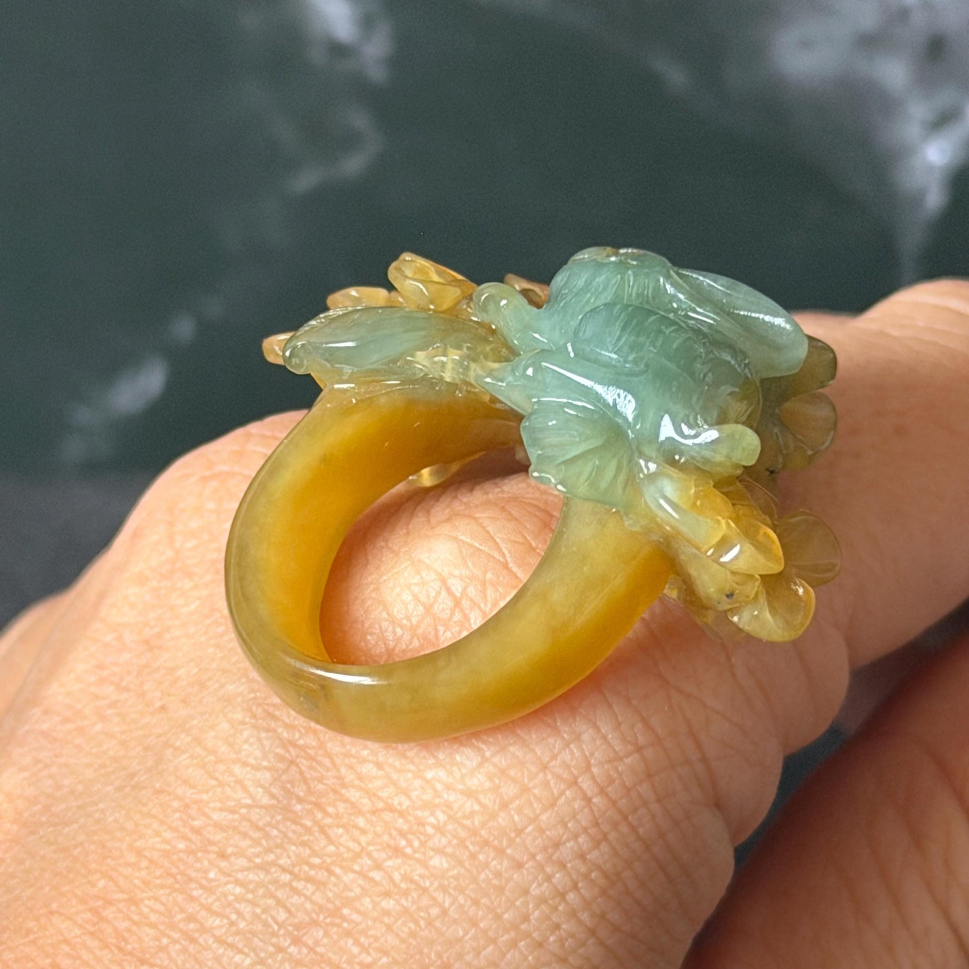 Xiu Jade (Serpentine) Hand Carved Rabbit & Flower Statement Ring 17.7mm (US 7-7.25): Natural Green Yellow Jade 3D stone carving Statement Ring Band Ring gift for her green jade carving yellow jade bi colour jade rabbit carving hand engraved statement ring flower carving hand carved flower natural untreated jade handcrafted jade ring 3D carving Stone carving Gemstone Carving rabbit Lover gift jade cocktail ring jade band ring bunny ring bunny carving