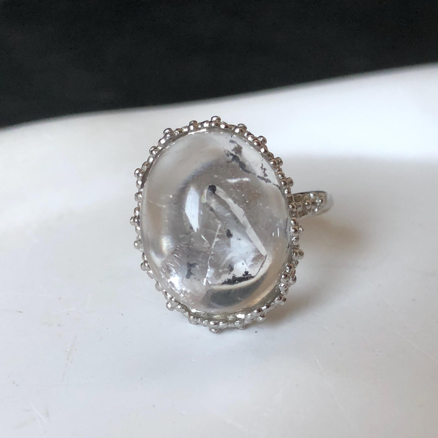 Polished Enhydro Quartz (Herkimer Diamond) S925 Silver Adjustable Ring: Mild Rainbow! Moving Sand and Black Bubble Inclusion Crystal Statement Ring for Women ring crystal band ring crystal cocktail ring crystal stackable ring 7 chakra crystal ring meditation crystal healing stone birthstone silver ring ring for men rainbow quartz inclusion quartz inclusion crystal minerals specimen silver ring free size ring adjustable ring holder