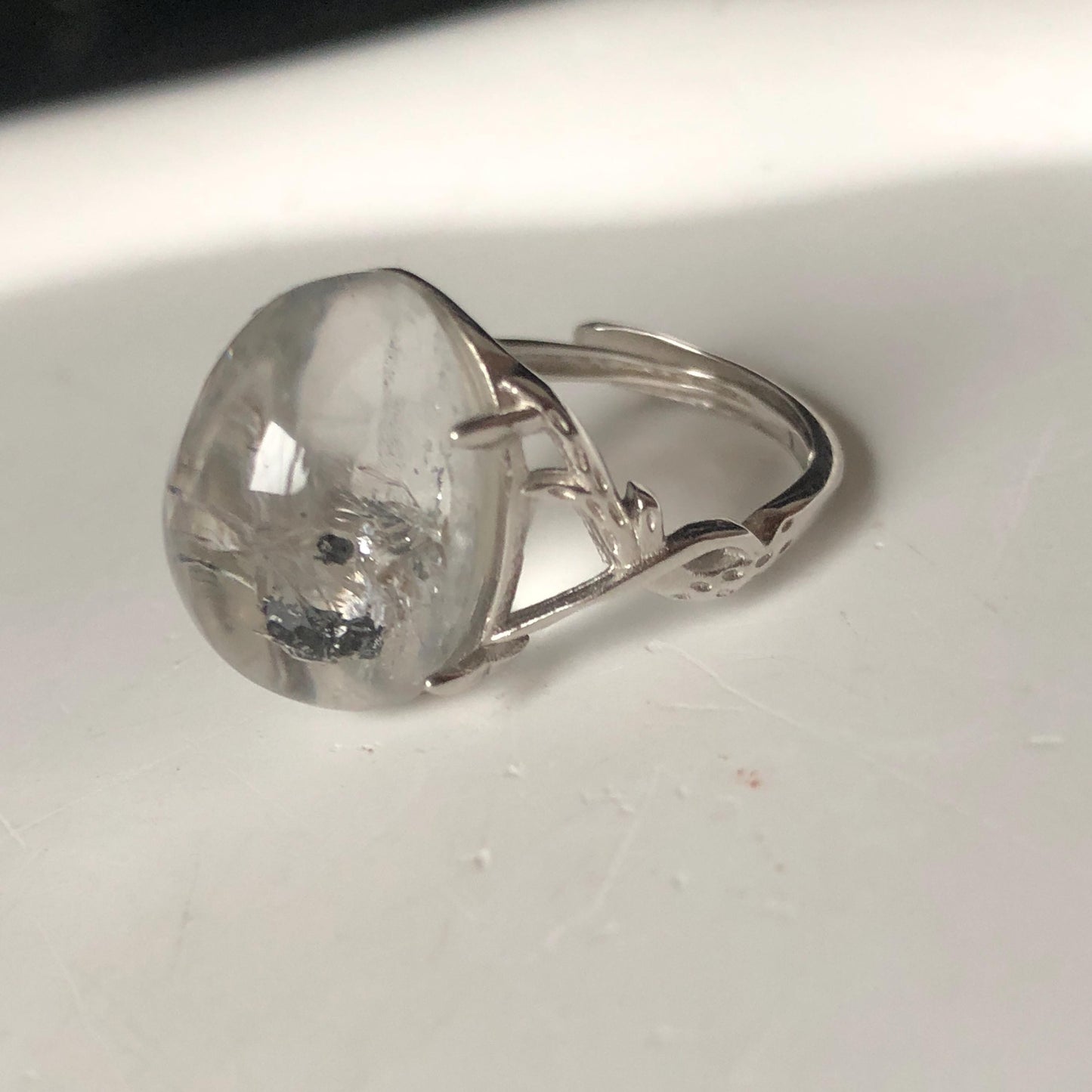 Polished Enhydro Quartz (Herkimer Diamond) S925 Silver Adjustable Ring: Big Rainbow! Moving Sand and Black Bubble Inclusion Crystal Statement Ring for Women ring crystal band ring crystal cocktail ring crystal stackable ring 7 chakra crystal ring meditation crystal healing stone birthstone silver ring ring for men rainbow quartz inclusion quartz inclusion crystal minerals specimen silver ring free size ring adjustable ring holder rain quartz enhydro crystal inclusion crystal inclusion quartz