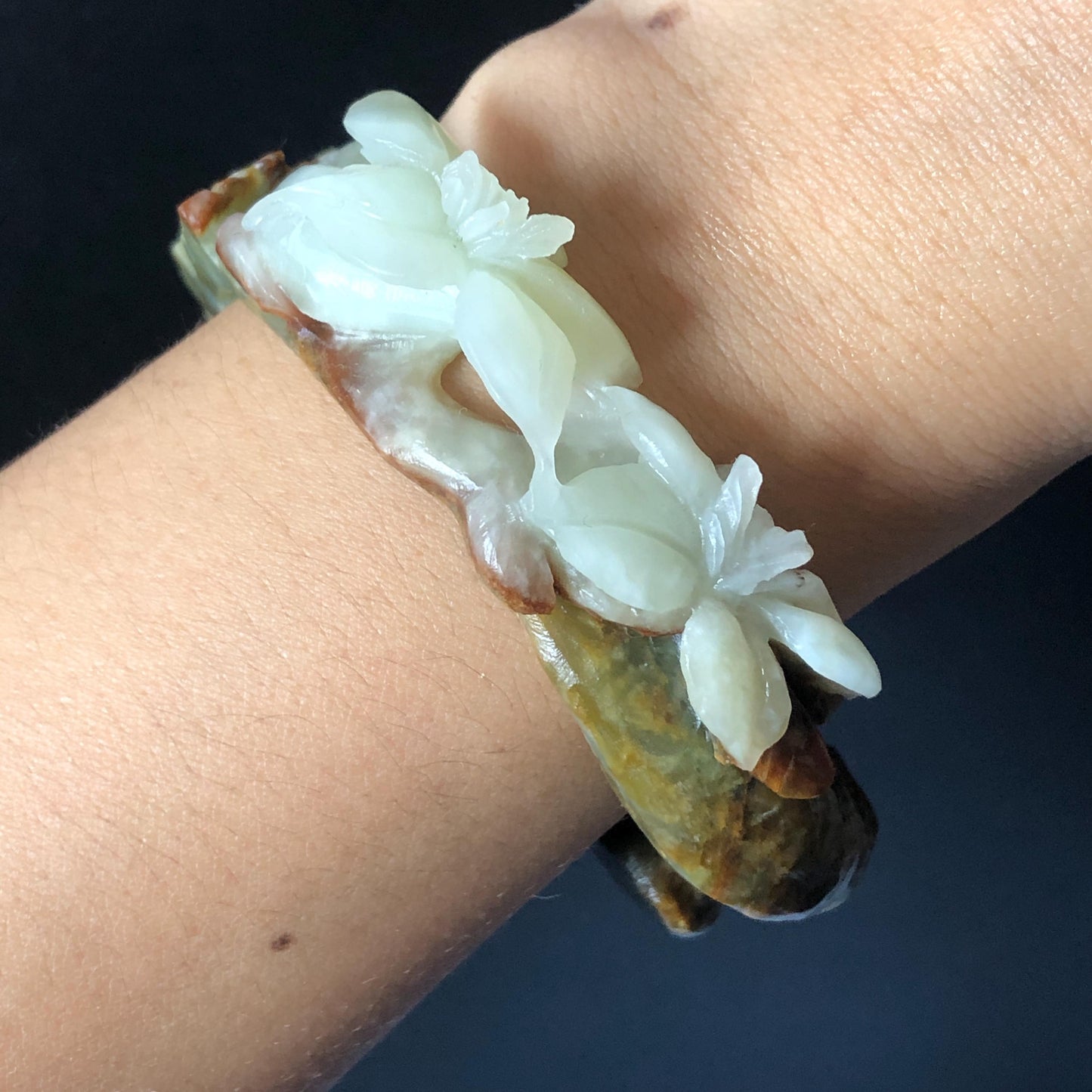 55.1mm Xiu Jade Serpentine Hand Carved Lily Flower Bangle: Natural Multi color Brown Green White Jade Handcrafted Bracelet, Stone Carving Gemstone Jewelry Gift for her irregular jade bangle jade carving hand engraved stone carving natural untreated jade bracelet black jade white jade green jade brown jade handcraft jade lily carving flower carving chinese jade vintage bangle antique bracelet sesame bracelet multi colour jade pine tree