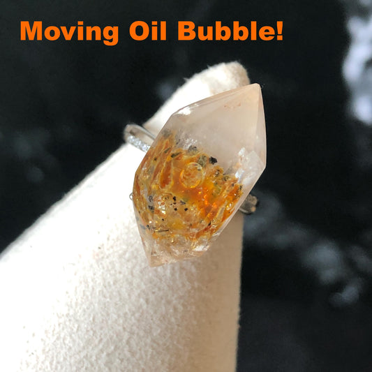 Polished Petroleum Enhydro Quartz S925 Silver Adjustable Ring: Clear Bubble in Golden Red Petroleum Oil Inclusion | Natural Gemstone Birthstone Gift for her golden red oil enhydro quartz cocktail ring for women bold ring for men meditation rock healing stone chakra crystal big size ring crystal band ring herkimer diamond silver ring stackable ring women statement ring minerals specimen inclusion quartz inclusion crystal cocktail ring stackable ring