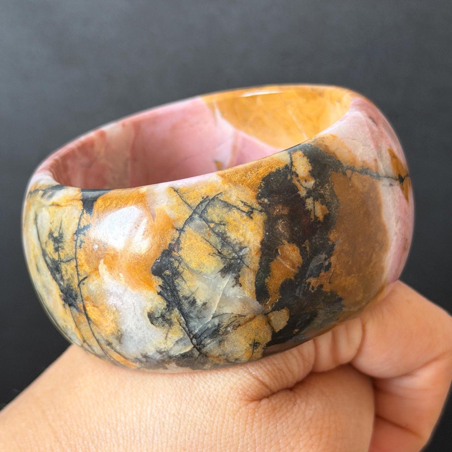 57.1mm Rhodonite Stone Bangle: Golden Fish and Maple forest Scenery Bracelet | Natural Gold Yellow & Baby Pink Healing Stone Gift for her rhodonite bangle pink rhodonite bracelet pink crystal bracelet pink stone bangle pink gemstone bracelet golden crystal wide bangle healing crystal love stone meditative crystal heart chakra crystal vintage bangle gemstone bangle dragon bangle dragon bracelet brown bangle flower crystal flower lover gift women bangle fish lover gift Golden Arowana maple leaves