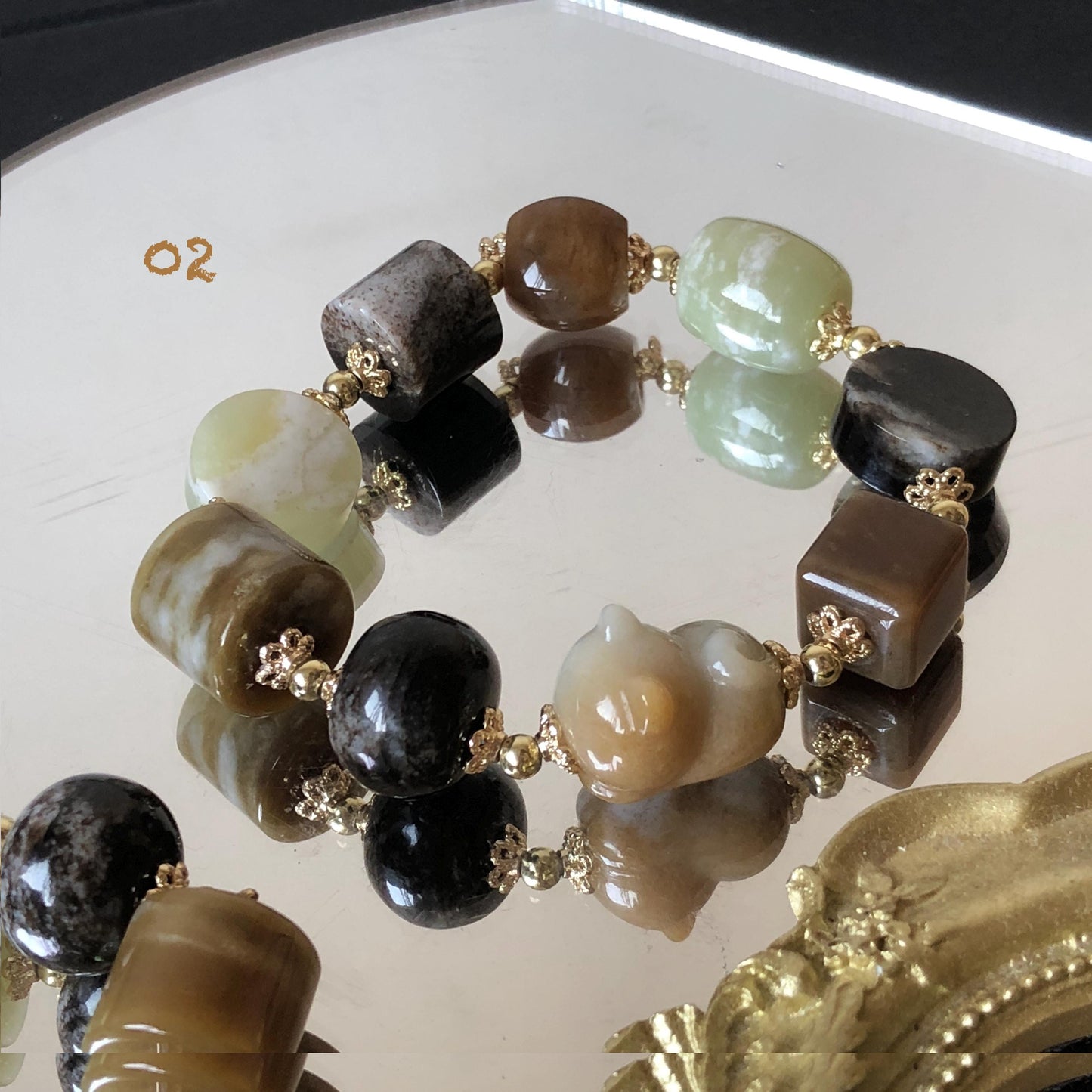 Nephrite Jade Hand Carved Cat Kitten Charm Bracelet | Milk Tea & Cookies Collection | Untreated Natural White Jade Brown Jade Elastic Big Bead Bracelet Chinese Jade Vintage Bracelet Antique Bracelet Gift for her Flexible Bracelet with honey brown jade deep brown jade white jade 14k gold plated accessory nephrite beads bold bracelet irregular beads bracelet tailor made bracelet customized bracelet diy bracelet hand engraved cat carving handcrafted kitten carving cat lover gift