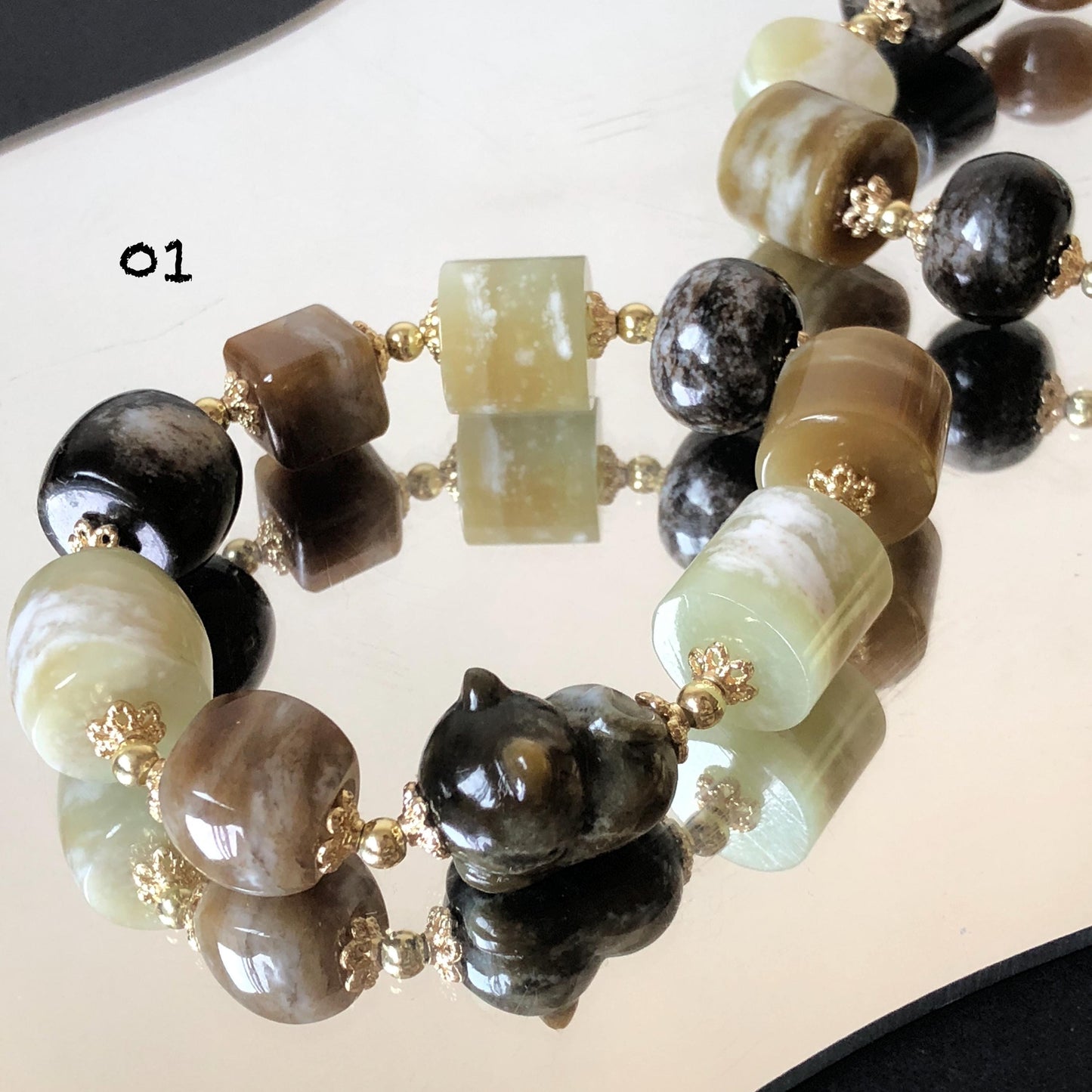 Nephrite Jade Hand Carved Cat Kitten Charm Bracelet | Milk Tea & Cookies Collection | Untreated Natural White Jade Brown Jade Elastic Big Bead Bracelet Chinese Jade Vintage Bracelet Antique Bracelet Gift for her Flexible Bracelet with honey brown jade deep brown jade white jade 14k gold plated accessory nephrite beads bold bracelet irregular beads bracelet tailor made bracelet customized bracelet diy bracelet hand engraved cat carving handcrafted kitten carving cat lover gift