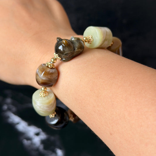 Nephrite Jade Hand Carved Cat Kitten Charm Bracelet | Milk Tea & Cookies Collection | Untreated Natural White Jade Brown Jade Elastic Big Bead Bracelet Chinese Jade Vintage Bracelet Antique Bracelet Gift for her Flexible Bracelet with honey brown jade deep brown jade white jade 14k gold plated accessory nephrite beads bold bracelet irregular beads bracelet tailor made bracelet customized bracelet diy bracelet hand engraved cat carving handcrafted kitten carving cat lover gift