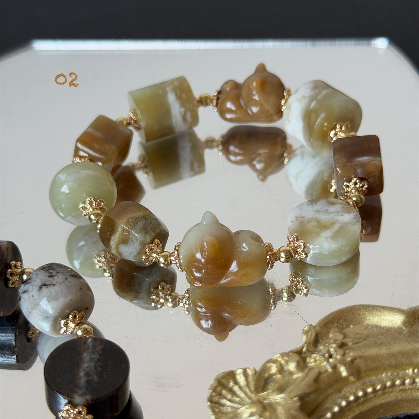 Nephrite Jade Hand Carved Cat Kitten Charm Bracelet | Milk Tea & Cookies Collection | Untreated Natural White Jade Brown Jade Elastic Big Bead Bracelet Chinese Jade Vintage Bracelet Antique Bracelet Gift for her Flexible Bracelet with honey brown jade deep brown jade white jade 14k gold plated accessory nephrite beads bold bracelet irregular beads bracelet tailor made bracelet customized bracelet diy bracelet hand engraved cat carving handcrafted kitten carving cat lover gift