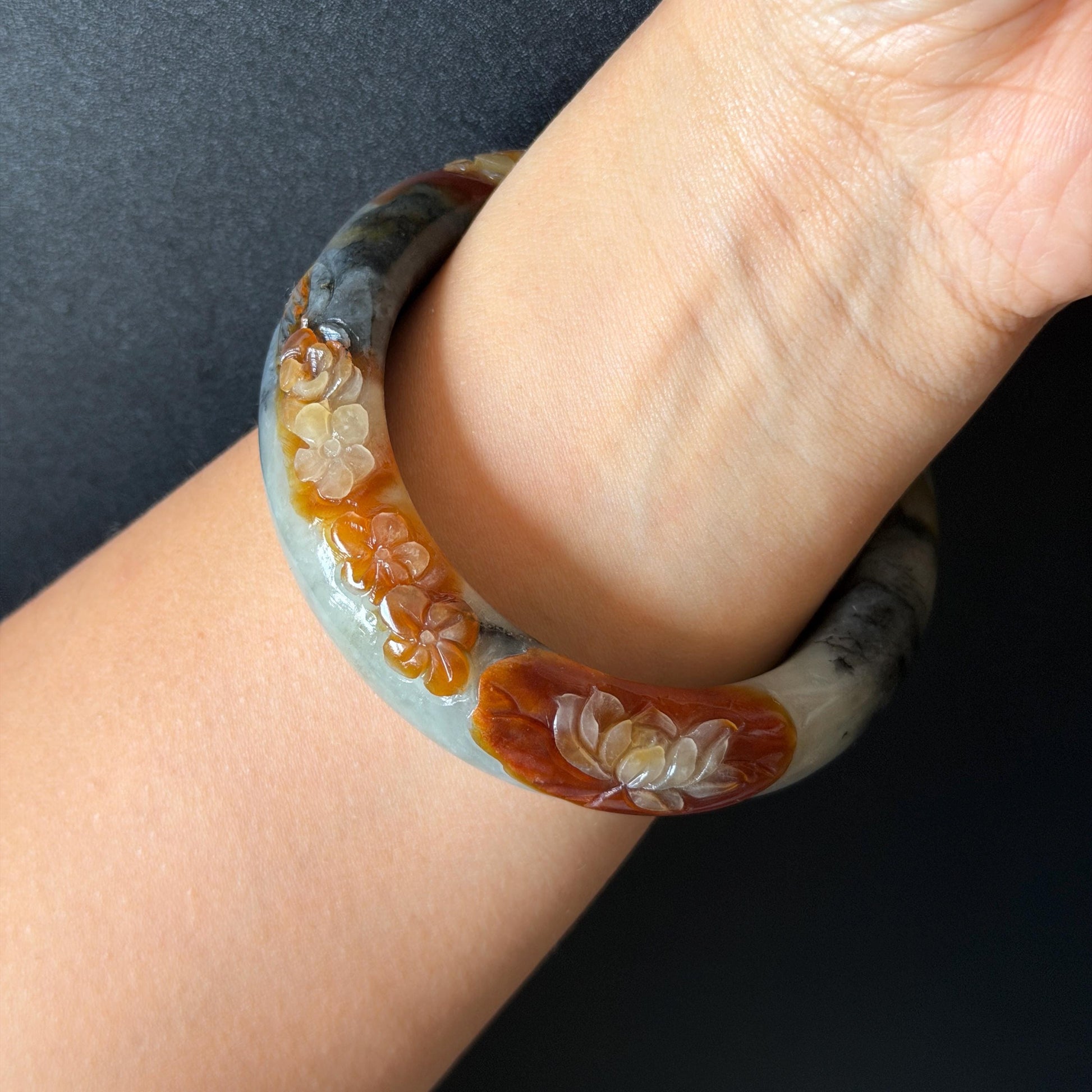 58.3mm Xiu Jade Serpentine Hand Carved Peony Flower Bangle: Natural Multicolor Grey Brown White Jade Handcrafted Bracelet, Stone Carving Gemstone Jewelry Gift for her wide jade bangle jade carving hand engraved stone carving natural untreated jade bracelet white jade brown jade brown black jade handcrafted jade lotus carving flower carving chinese jade vintage bangle antique bracelet sesame bracelet multi colour jade multicolor jade mother day gift peony carving flower carving jade carving