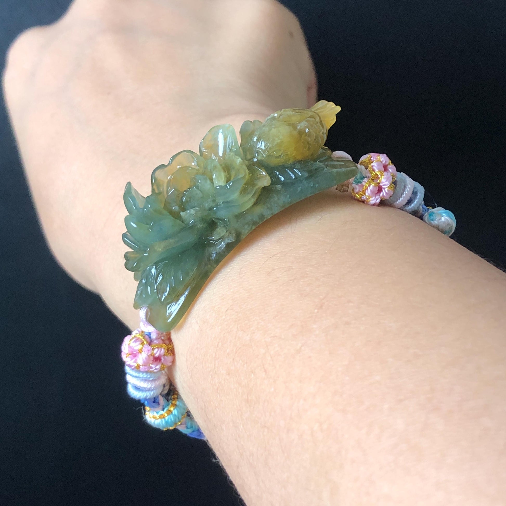 Natural Xiu Jade Serpentine Hand Carved Bird & Flower Charm Braided Bracelet: Green and Yellow Jade Adjustable Bracelet 3D Stone Carving adjustable bracelet woven bracelet rope 3D jade carving green jade yellow jade multicolour jade natural untreated jade handcrafted charm bead bracelet handmade bracelet bird carving flower carving hand engraved charm chinese braided bracelet vintage bracelet antique bracelet lucky rope peony carving