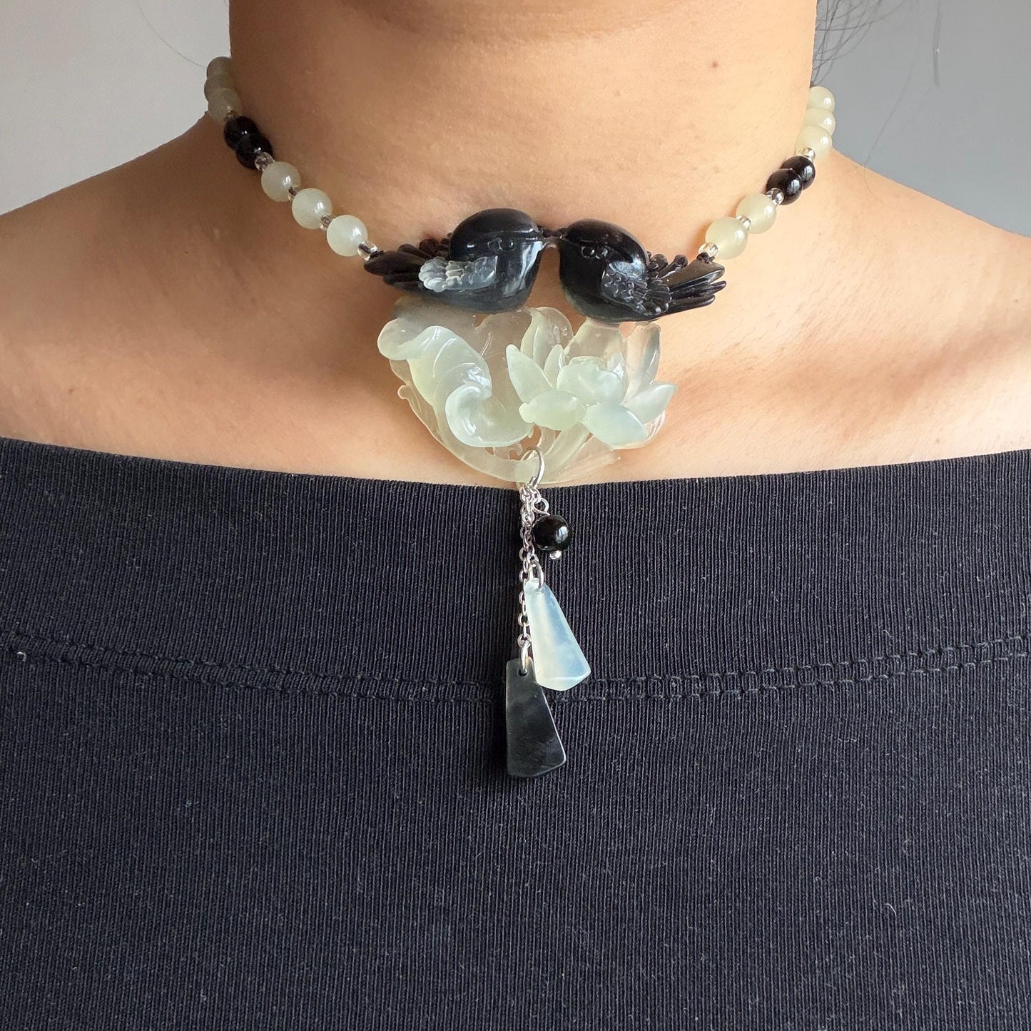 Xiu Jade Magpie Birds and Lotus Flower Hand Carved Pendant Adjustable Necklace Choker: Certified Natural Serpentine Black White Jade Handcrafted Charm | Fortune & Happiness | Stone Crystal Gemstone Jewellery Gift for her, black jade carving white jade carving lotus carving flower carving hand engraved lotus chinese jade pendant necklace vintage necklace antique necklace certificate jade natural untreated jade certified jade modern necklace bird carving braided necklace dangle wedding gift
