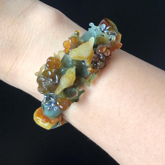Xiu Jade Magpie Birds Plum Blossom Flower Hand Carved Charm with Irregular Bead Stretch Elastic Bracelet : Natural Serpentine Multicolor jade Yellow Green Yellow Jade with Vintage Tibetan Silver | Handcrafted Crystal Stone Gemstone Gift for her  Blue Jade Carving Green Jade Yellow Jade Brown Jewelry diy bracelet ntreated jade engraved  bird charm big bead elastic stretch bracelet 3D stone carving personalized bracelet personalised gift customized bracelet tailor made bird lover gift