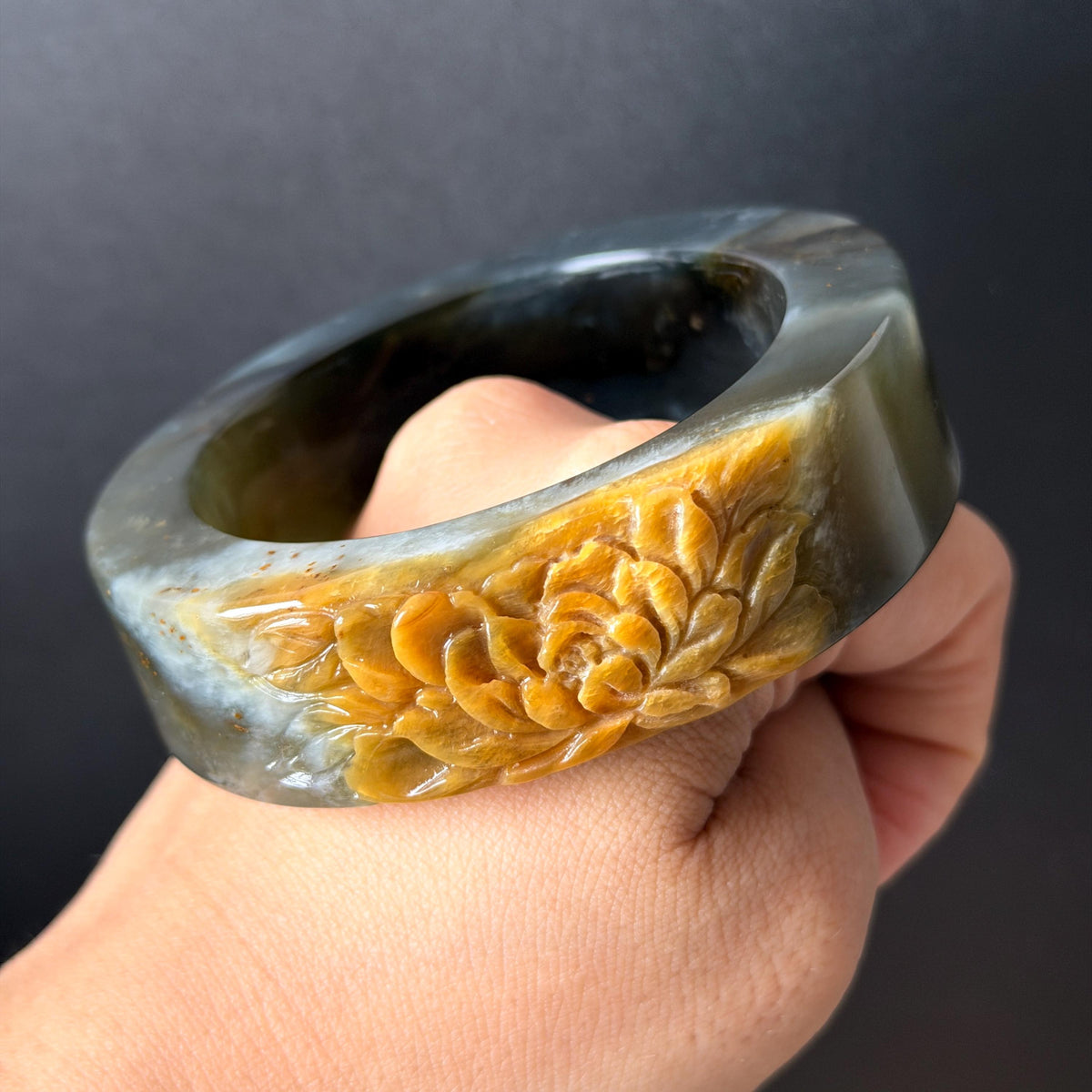 57.5mm Xiu Jade Serpentine Hand Carved Peony Flowers Bangle: Natural Black Jade Handcrafted Bracelet, Stone Carving Gemstone Jewelry Gift for her wide jade bangle jade carving hand engraved stone carving natural untreated jade bracelet black jade yellow jade handcraft jade peony carving flower carving chinese jade vintage bangle antique bracelet 3D stone carving jade carving