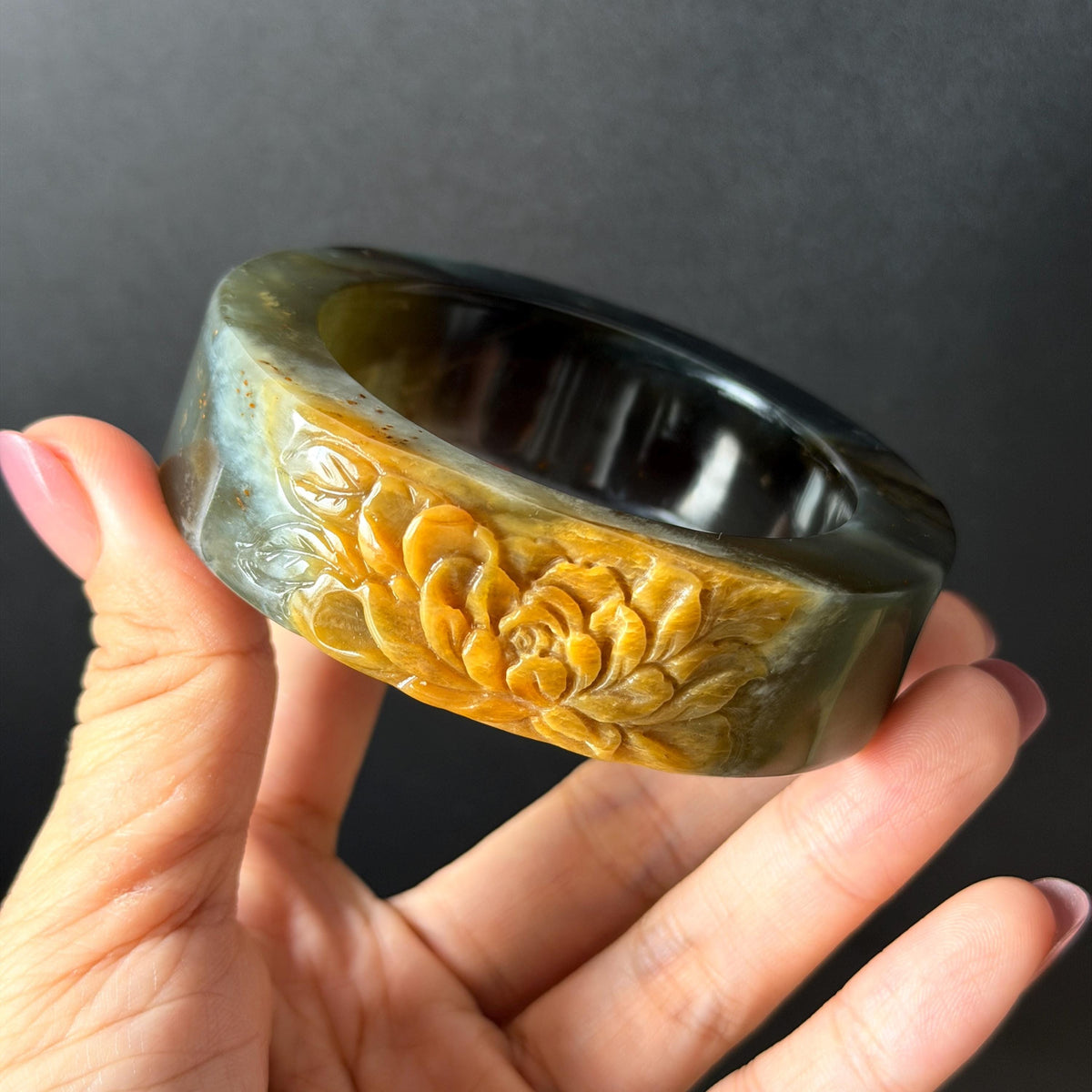 57.5mm Xiu Jade Serpentine Hand Carved Peony Flowers Bangle: Natural Black Jade Handcrafted Bracelet, Stone Carving Gemstone Jewelry Gift for her wide jade bangle jade carving hand engraved stone carving natural untreated jade bracelet black jade yellow jade handcraft jade peony carving flower carving chinese jade vintage bangle antique bracelet 3D stone carving jade carving
