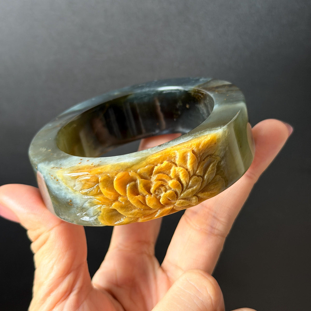 57.5mm Xiu Jade Serpentine Hand Carved Peony Flowers Bangle: Natural Black Jade Handcrafted Bracelet, Stone Carving Gemstone Jewelry Gift for her wide jade bangle jade carving hand engraved stone carving natural untreated jade bracelet black jade yellow jade handcraft jade peony carving flower carving chinese jade vintage bangle antique bracelet 3D stone carving jade carving